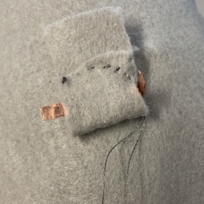 battery pouch try one- I used conductive thread which made it not work.