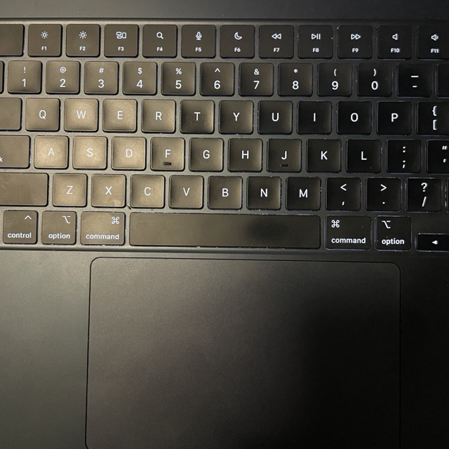 click clacking away at a mac-book laptop keyboard. It is a light and unobrusive sound.